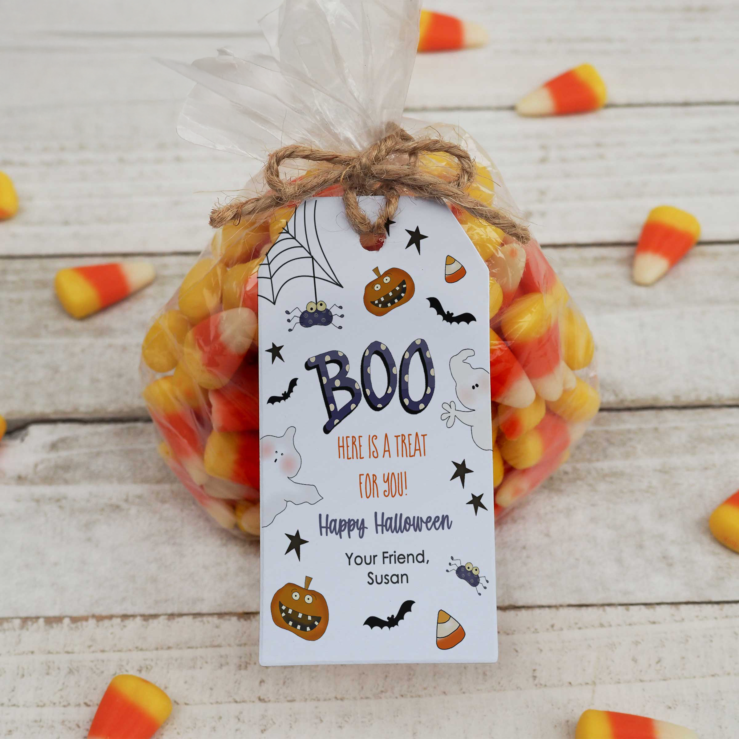 Bat Halloween Hang Tag with angled corners on candy corn bag