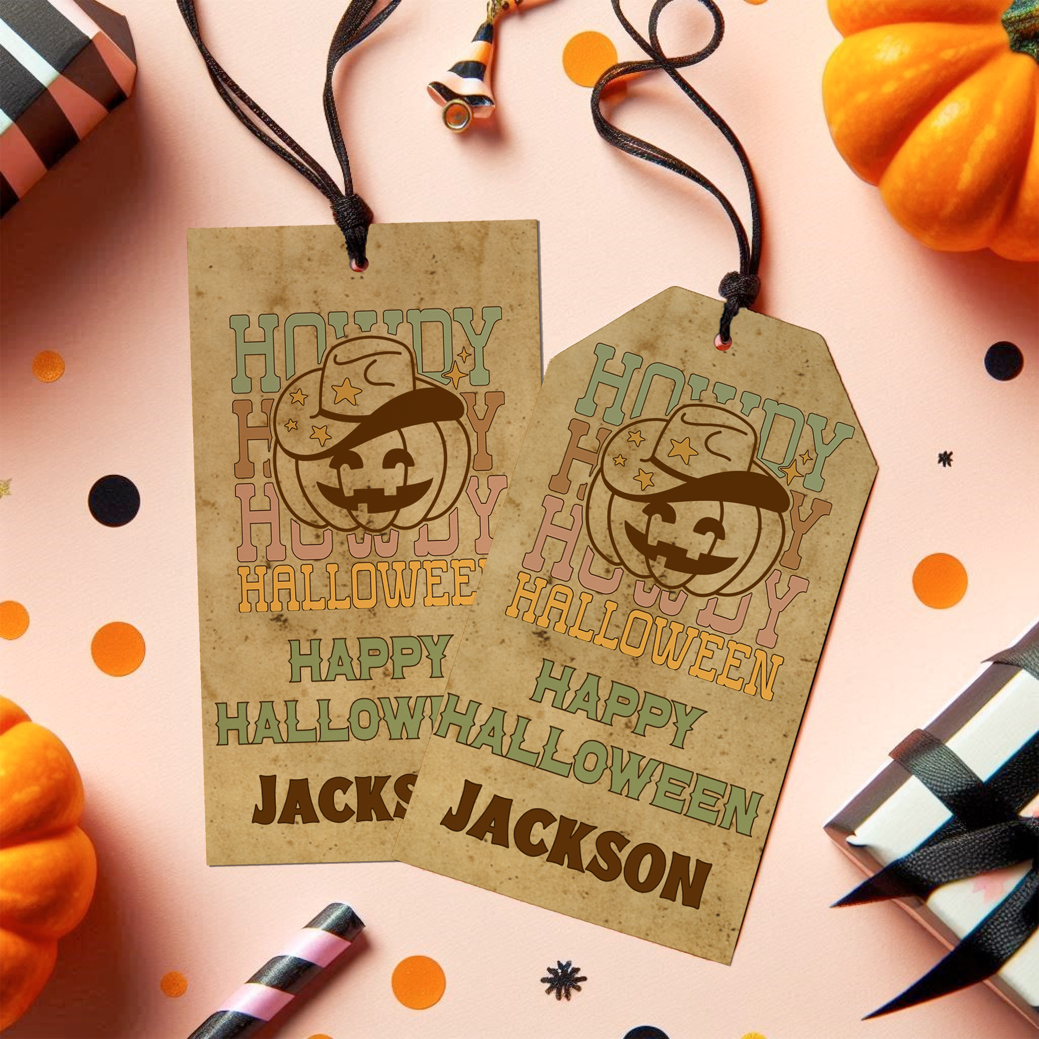 Two Halloween-themed gift tags with pumpkins and ribbons on a pink background