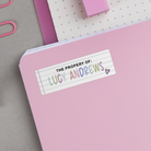Lined Paper Name Stickers on back of pink notebook