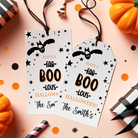 Halloween gift tags with personalized text on a festive background with pumpkins and ribbons.